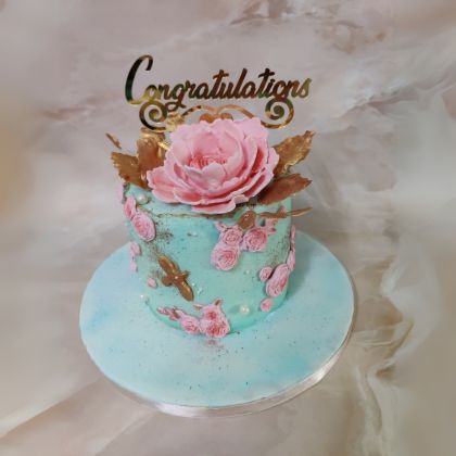 blue floral engagement cake