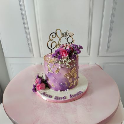 lilac floral engagement cake
